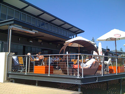 The Naked Fig Cafe deck bathed in morning sunshine